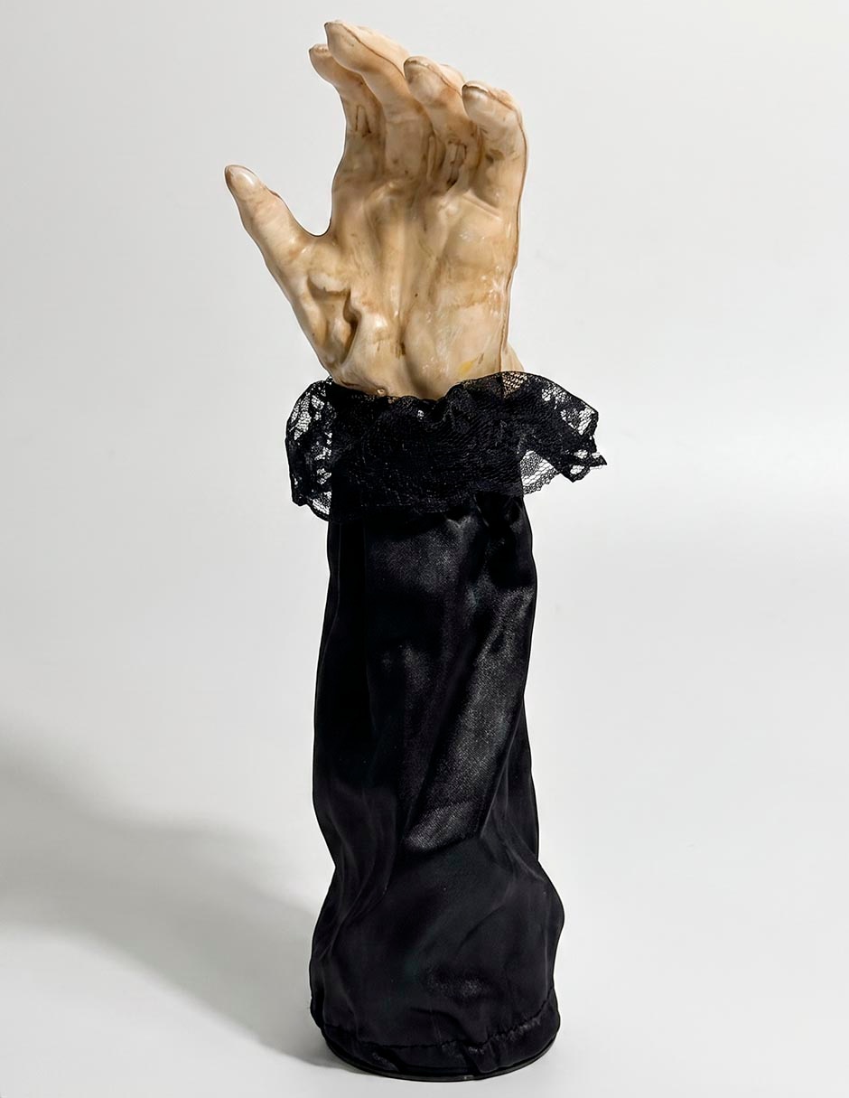 Figura decorativa con forma de mano